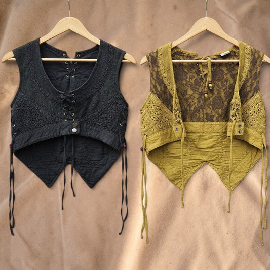 Valentina Artisan Gilet in black and olive green with lace textures, adjustable lace-up front, and cropped hem.