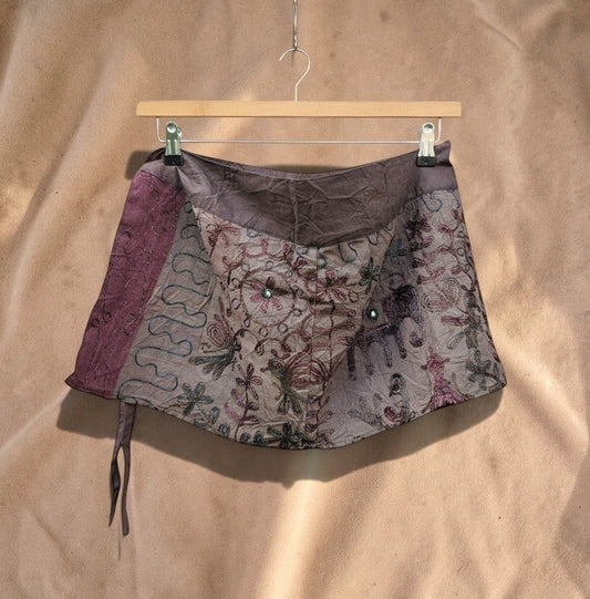 Valentina Dusk Caravan adjustable wrap skirt in blue-grey with aubergine panel and intricate hand-stitched embroidery