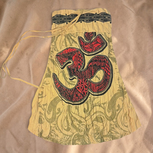 Valentina Om Spirit summer dress in sand with a large red and black Om symbol print and adjustable shoulder straps.